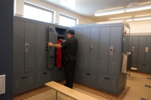 Officer accessing personal storage locker at Central Marin Police Department