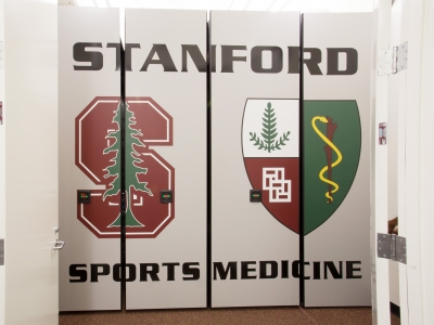 Custom endpanels in locker room featuring sports team logo